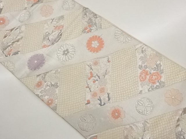襷に花々・鹿の子模様織出し袋帯
